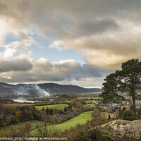 Buy canvas prints of Majestic Autumn Fall landscape image of view from Castlehead in Lake District over Derwentwater towards Catbells and Grisedale Pike at sunset with epic lighting in sky by Matthew Gibson