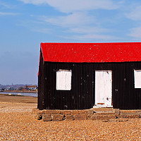 Buy canvas prints of Rye Harbour Red and Black Fisherman's Hut by Ian Philip Jones