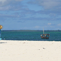 Buy canvas prints of Zanzibari beachseller by Hannah Hopton
