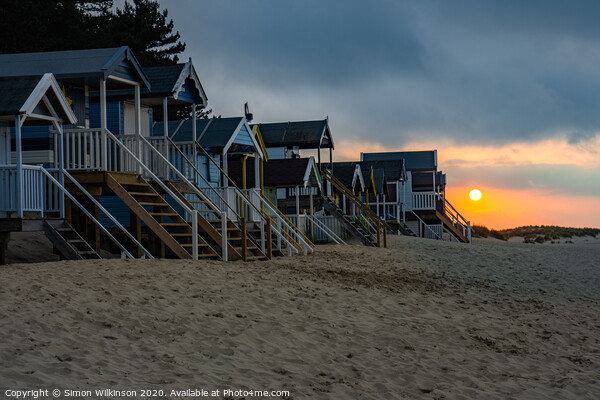 Beach Huts at Sunset  Picture Board by Simon Wilkinson