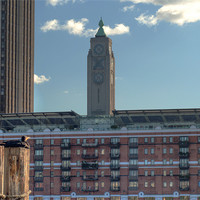 Buy canvas prints of Oxo Tower and admirer by Chris Day