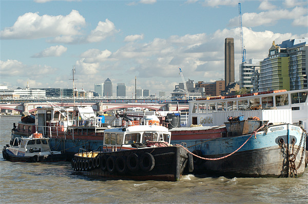 Thames barges and Canary Wharf Picture Board by Chris Day