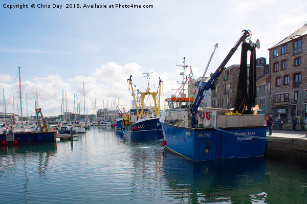 Fishing boats in Sutton Harbour Picture Board by Chris Day