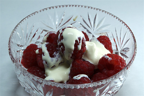 Bowl of Raspberries and cream Picture Board by Chris Day