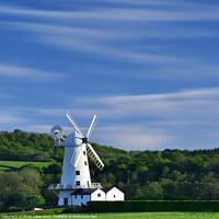 Buy canvas prints of Llancayo Windmill: A Summer's Resurgence by Philip Veale