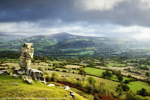 Sugar Loaf and Skirrid under a Stormy Sky. Picture Board by Philip Veale