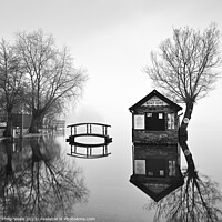 Buy canvas prints of Llangorse Lake Boathouse Reflection in Monochrome. by Philip Veale