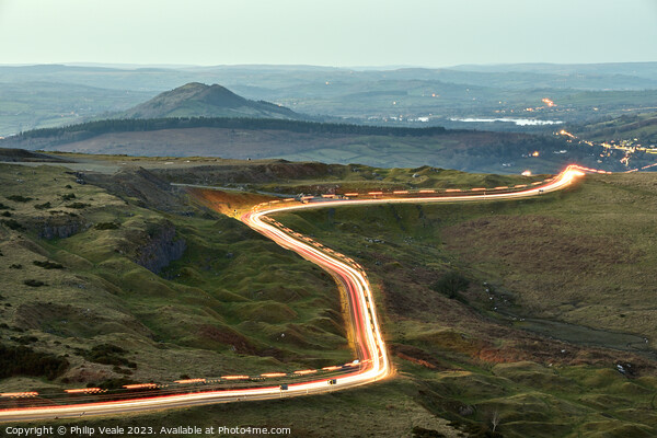 Gritter light trails on Llangynidr Moors. Picture Board by Philip Veale