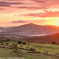 Buy canvas prints of Sugar Loaf and Skirrid Golden Sunrise. by Philip Veale