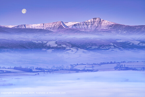 Brecon Beacons in winter under a full moon. Picture Board by Philip Veale