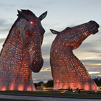Buy canvas prints of Kelpies at Sunset in Red. by Philip Veale