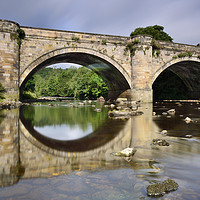 Buy canvas prints of Richmond Bridge Reflection in River Swale. by Philip Veale