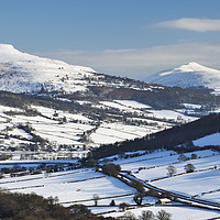 Buy canvas prints of Sugar Loaf and Pen Cerrig Calch in Winter. by Philip Veale
