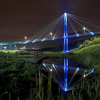 Buy canvas prints of Tyllwyn Footbridge: Night-time Reflection. by Philip Veale