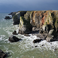 Buy canvas prints of Stack Rocks Pembrokeshire as a storm approaches. by Philip Veale