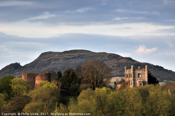 Abergavenny Castle and Skirrid Mountain at Dusk. Picture Board by Philip Veale