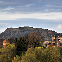 Buy canvas prints of Abergavenny Castle and Skirrid Mountain at Dusk. by Philip Veale