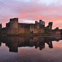 Buy canvas prints of Caerphilly Castle Sunrise Reflection. by Philip Veale