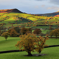 Buy canvas prints of Skirrid and Sugar Loaf in Autumn's First Light. by Philip Veale