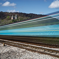 Buy canvas prints of Castell Coch as Train Speeds Past. by Philip Veale
