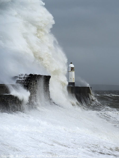 Porthcawl Lighthouse Battles Storm Freya. Picture Board by Philip Veale