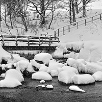 Buy canvas prints of Cwmtillery Lake Foot Bridge after Heavy Snow. by Philip Veale