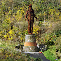Buy canvas prints of Guardian Statue at Six Bells in Autumn Colours. by Philip Veale