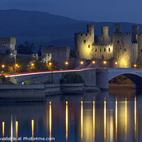 Buy canvas prints of Conwy Castle's Enchanting Night Time Reflection by Philip Veale