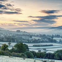 Buy canvas prints of Llanhamlach's Frost Covered Fields at Sunrise. by Philip Veale