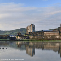 Buy canvas prints of Caerphilly Castle Dawn Reflection. by Philip Veale