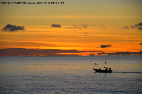 Tropical nautical sunrise seascape with fishing boat silhouette. Picture Board by Geoff Childs