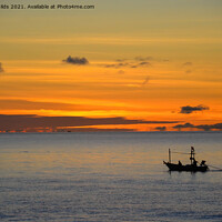 Buy canvas prints of Tropical nautical sunrise seascape with fishing boat silhouette. by Geoff Childs