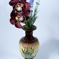 Buy canvas prints of  Purple Cymbidium Orchids (Boat Orchids) in a vint by Geoff Childs