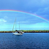 Buy canvas prints of Australian rainbow in blue sky. by Geoff Childs