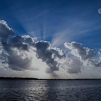 Buy canvas prints of Magnificent Sunbeam Cloudscape. by Geoff Childs
