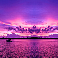 Buy canvas prints of  Coastal sunrise seascape in a purple sky.  by Geoff Childs