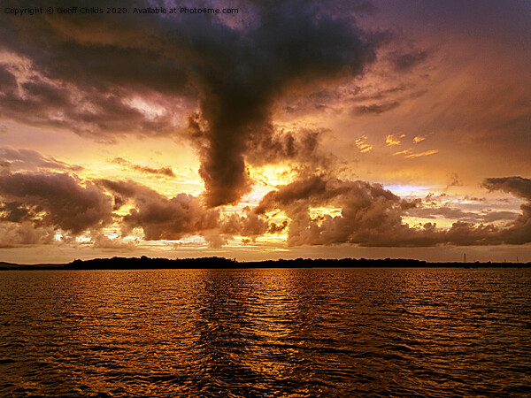 Turbulent golden cloudy seascape sunset. Picture Board by Geoff Childs