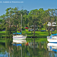 Buy canvas prints of Yachts and green parkland, Lake Macquarie. by Geoff Childs