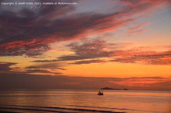 A bright orange ocean sunrise seascape. Picture Board by Geoff Childs