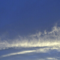 Buy canvas prints of White Cirrus Cloud in Blue Sky by Geoff Childs
