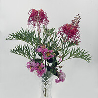 Buy canvas prints of Grevillea and Lantana blooms in a vase. by Geoff Childs