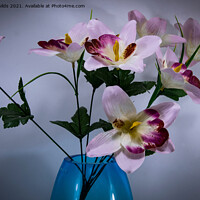 Buy canvas prints of A Pretty display of pink and red artificial flowers. by Geoff Childs