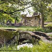 Buy canvas prints of The Packhorse Bridge at Wycoller. by Chris North