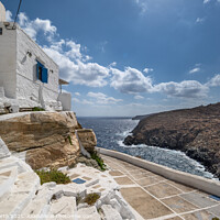 Buy canvas prints of House overlooking the sparkling Mediterranean Sea in the hillside village of Kastro on Sifnos Island. by Chris North