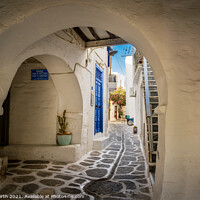 Buy canvas prints of The back streets ofold  Paros town by Chris North