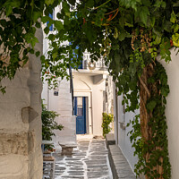Buy canvas prints of The back streets of old  Paros town. by Chris North