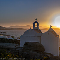 Buy canvas prints of Sunset over the Aegean Sea in Mykonos, Greece. by Chris North