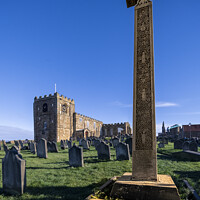 Buy canvas prints of Celtic cross and Saint Hilda's Abbey Whitby. by Chris North