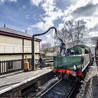 Buy canvas prints of Taking on water at Keighley station. by Chris North