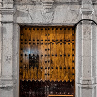 Buy canvas prints of Antique Spanish door. by Chris North
